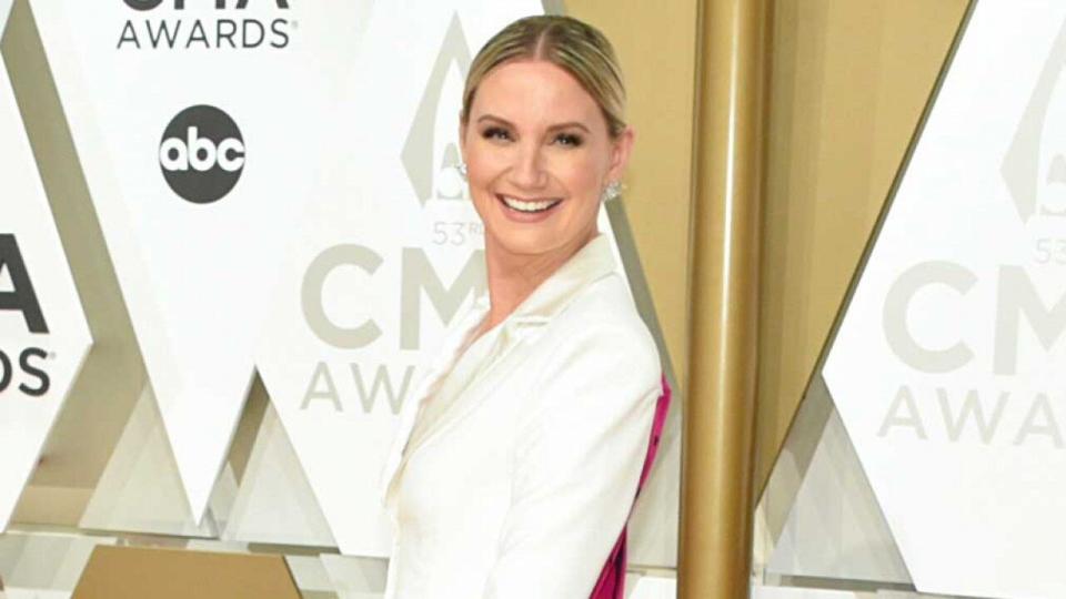 The Sugarland singer stands for equality in a statement-making suit on the CMA Awards red carpet.