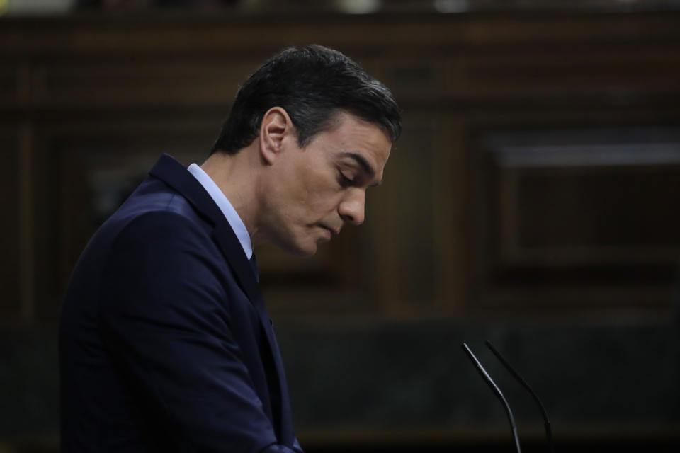 Spain's interim Prime Minister Pedro Sanchez pauses while addressing the Spanish Parliament in Madrid, Spain, Sunday, Jan. 5, 2020. Sanchez is facing the first of two opportunities Sunday to win the endorsement of the Spanish Parliament to form a left-wing coalition government. It would be Spain's first coalition government since the return of democracy following the death of dictator Francisco Franco in 1975. (AP Photo/Manu Fernandez)
