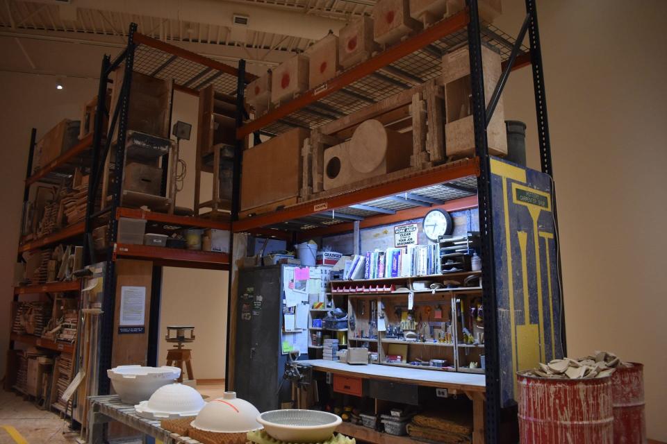 A glimpse inside the John Michael Kohler Arts Center's "Workplace" space shows the bench and artifacts of a 50-year tenured Kohler Company employee named Jerry Toerpe, as seen, Tuesday, March 12, in Sheboygan, Wis.