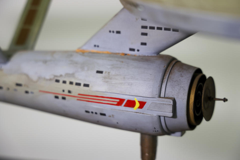 The first model of the USS Enterprise is displayed at Heritage Auctions in Los Angeles, April 13, 2024. The model — used in the original “Star Trek” television series — has been returned to Eugene “Rod” Roddenberry, the son of “Star Trek” creator Gene Roddenberry, decades after it went missing in the 1970s. (Josh David Jordan/Heritage Auctions via AP)