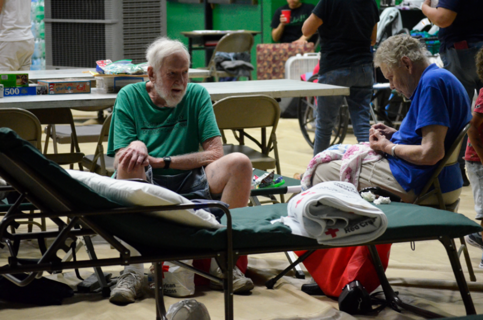 Tom and Emma Lou Griffin bide their time in the Eastern New Mexico University gymnasium Tuesday, June 18, 2024 after evacuating Ruidoso because of the South Fork Fire.