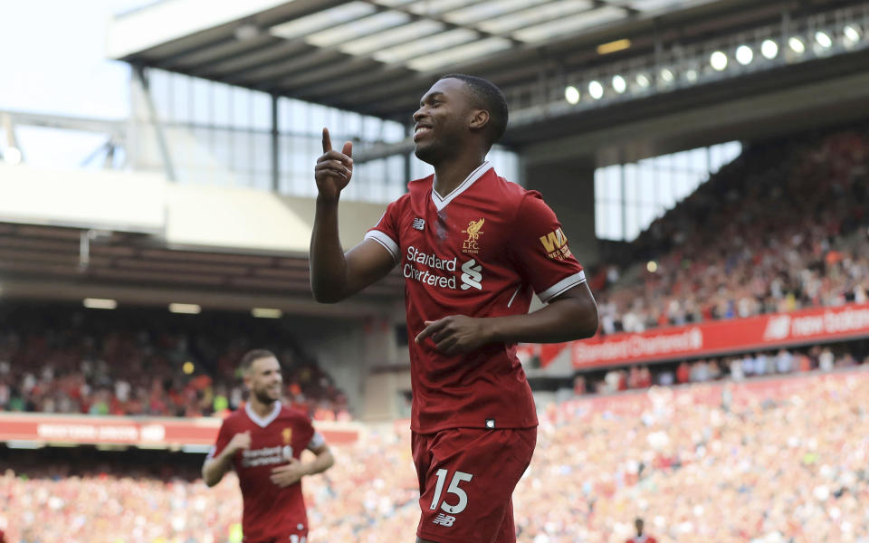 Liverpool’s Daniel Sturridge celebrates scoring at Anfield. (Peter Byrne/PA via AP)