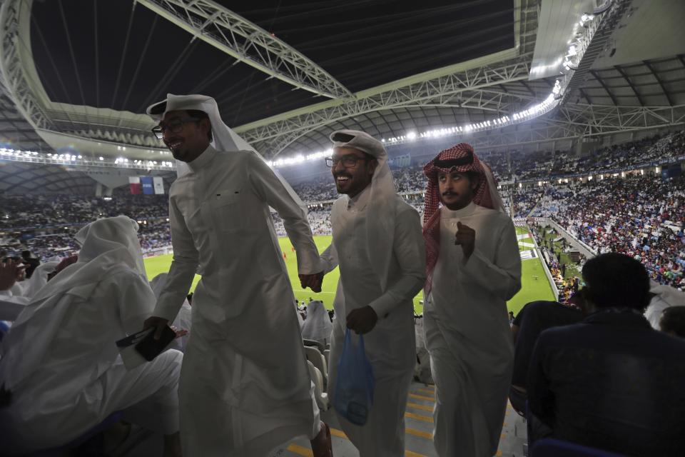 FILE - In this May 16, 2019, file photo, spectators leave their seats during the final soccer match half-time during the inauguration ceremony of the Al Janoub Stadium, formerly known as Al Wakrah Stadium, in Doha, Qatar. Qataris awoke to a surprise blockade and boycott by Gulf Arab neighbors 3 1/2 years ago, and this week were jolted again by the sudden announcement that it was all over. (AP Photo/Kamran Jebreili, File)