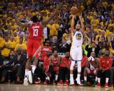 May 26, 2018; Oakland, CA, USA; Golden State Warriors guard Stephen Curry (30) shoots over Houston Rockets guard James Harden (13) in the second half in game six of the Western conference finals of the 2018 NBA Playoffs at Oracle Arena. Mandatory Credit: Kyle Terada-USA TODAY Sports
