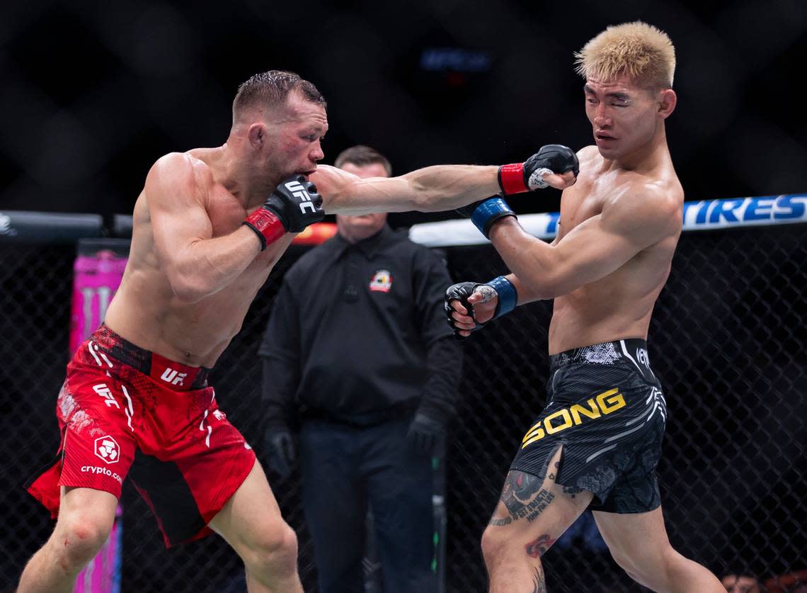 Peter Yan of Russia fights against Song Yadong of Chian during their bantamweight title match during the UFC 299 event at the Kaseya Center on Saturday, March 9, 2024, in downtown Miami, Fla.