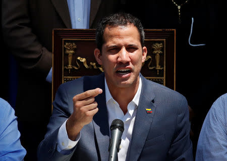 Venezuelan opposition leader Juan Guaido, who many nations have recognized as the country's rightful interim ruler, talks to the media during a news conference in Caracas, Venezuela March 10, 2019. REUTERS/Carlos Garcia Rawlins