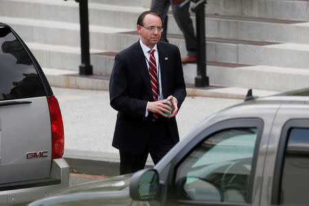 U.S. Deputy Attorney General Rod Rosenstein departs the West Wing of the White House after a meeting on FBI investigations into the 2016 Trump presidential campaign with U.S. President Donald Trump at the White House in Washington, U.S., May 21, 2018. REUTERS/Leah Millis