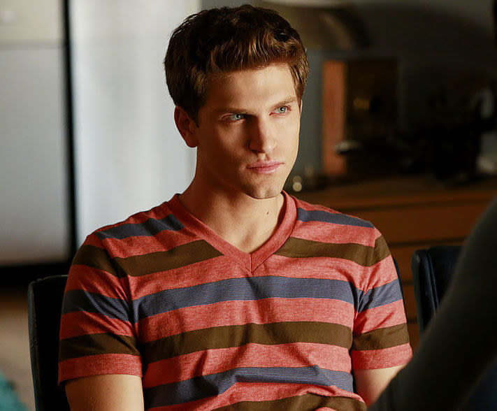 Keegan Allen, with brown hair and blue eyes