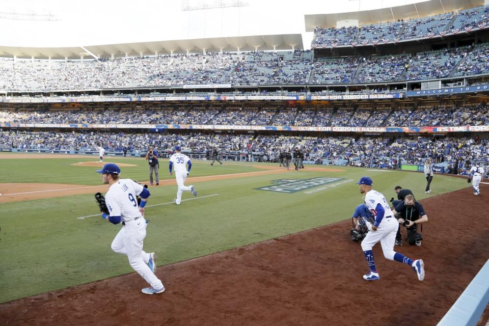 Dodgers take the field.