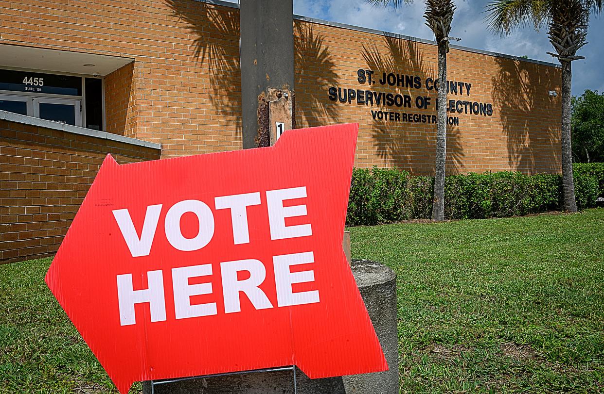 In this 2020 file photo, a sign directs early voters into the St. Johns County Supervisor of Elections office in St. Augustine.