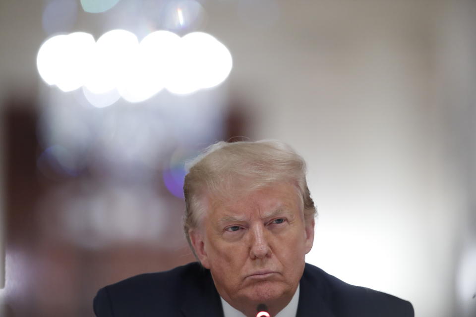 President Donald Trump listens during a "National Dialogue on Safely Reopening America's Schools," event in the East Room of the White House, Tuesday, July 7, 2020, in Washington. (AP Photo/Alex Brandon)