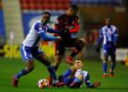 Soccer Football - FA Cup Third Round Replay - Wigan Athletic vs AFC Bournemouth - DW Stadium, Wigan, Britain - January 17, 2018 Bournemouth's Lys Mousset in action with Wigan Athletic’s Cheyenne Dunkley REUTERS/Phil Noble