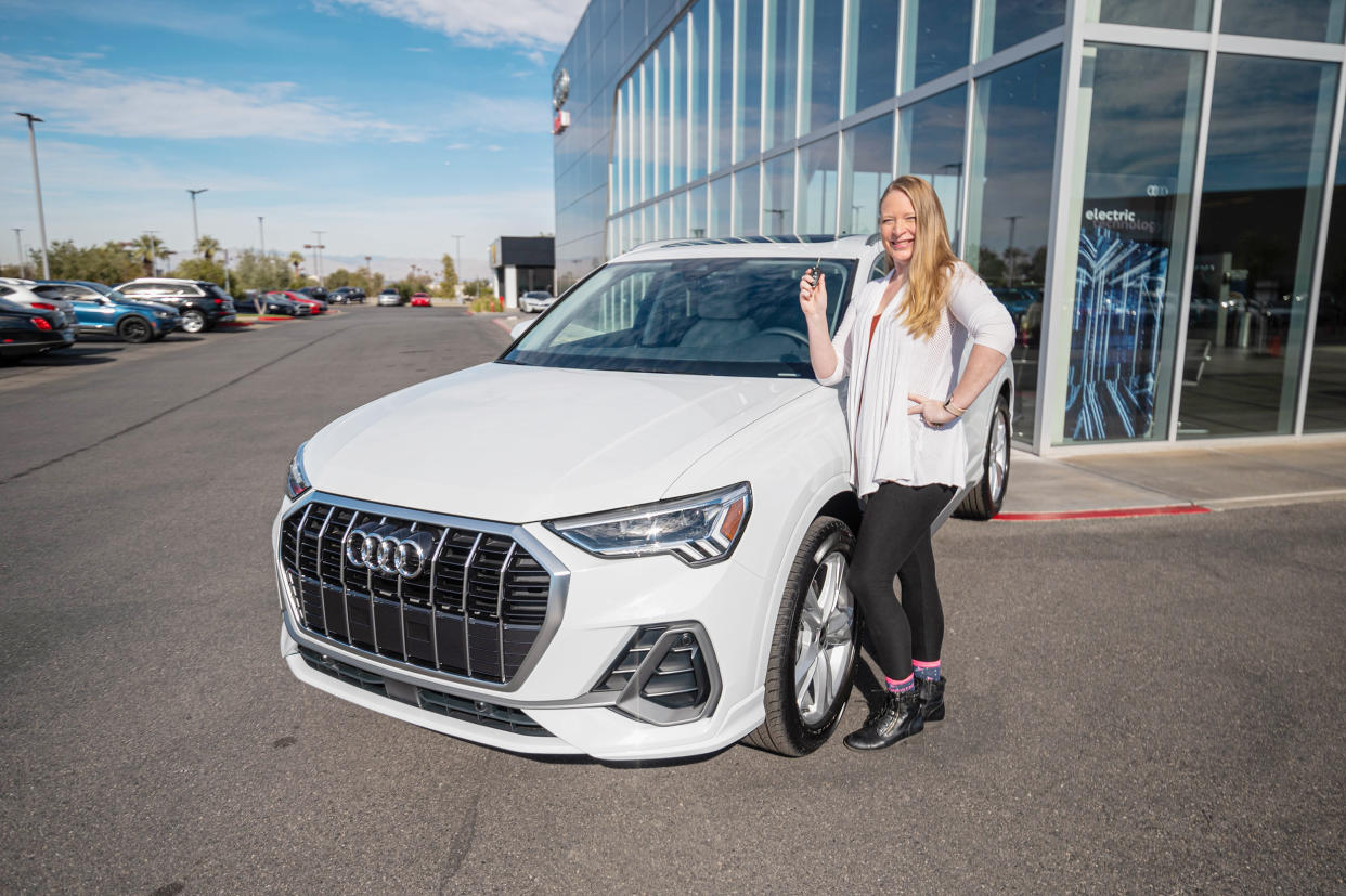 Rubush poses with her new Audi. (Drew Amato / Audi)