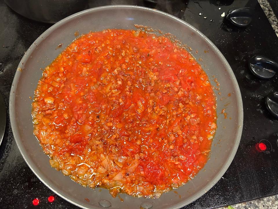 Making the sauce for Giada De Laurentiis' Bucatini All'Amatriciana pasta