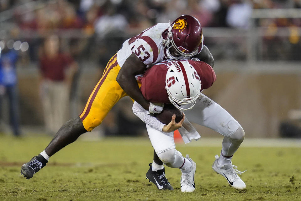 Southern California linebacker Shane Lee (53) sacks Stanford quarterback Tanner McKee during the second half of an NCAA college football game in Stanford, Calif., Saturday, Sept. 10, 2022. (AP Photo/Godofredo A. Vásquez)