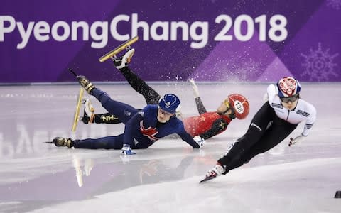 Elise Christie of Great Britain collides with Yang Zhou of China in the semi final of the Women's1500m during the Short Track Speed Skating on day eight of the PyeongChang 2018 Winter Olympic Games at Gangneung Ice Arena on February 17, 2018 - Credit: Getty Images