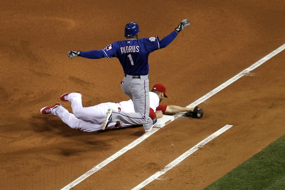 ST LOUIS, MO - OCTOBER 19: Chris Carpenter #29 of the St. Louis Cardinals tags first base for an out to beat Elvis Andrus #1 of the Texas Rangers during Game One of the MLB World Series at Busch Stadium on October 19, 2011 in St Louis, Missouri. (Photo by Ezra Shaw/Getty Images)