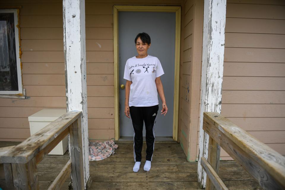 Jewel Bruner stands on the front patio of her Eagle Butte home on Wednesday, Sept. 20, 2023.