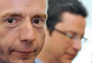 US Timothy Ray Brown (L), also known as “The Berlin Patient”, the first man to cure AIDS, next to german oncologist Gero Hütter (R) answers questions from journalists during the International Symposium HIV & Emerging Infectious Diseases (ISHEID), on May 23, 2012 in Marseille, southern France. Timothy Ray Brown infected with HIV for more than a decade was given an experimental transplant of bone marrow with cells that contained an unusual natural variant of the CCR5 delta 32 cell-surface receptor, proved resistant to HIV, by a team around German oncologist Gero Hütter. AFP PHOTO / GERARD JULIEN (Photo credit should read GERARD JULIEN/AFP/GettyImages)