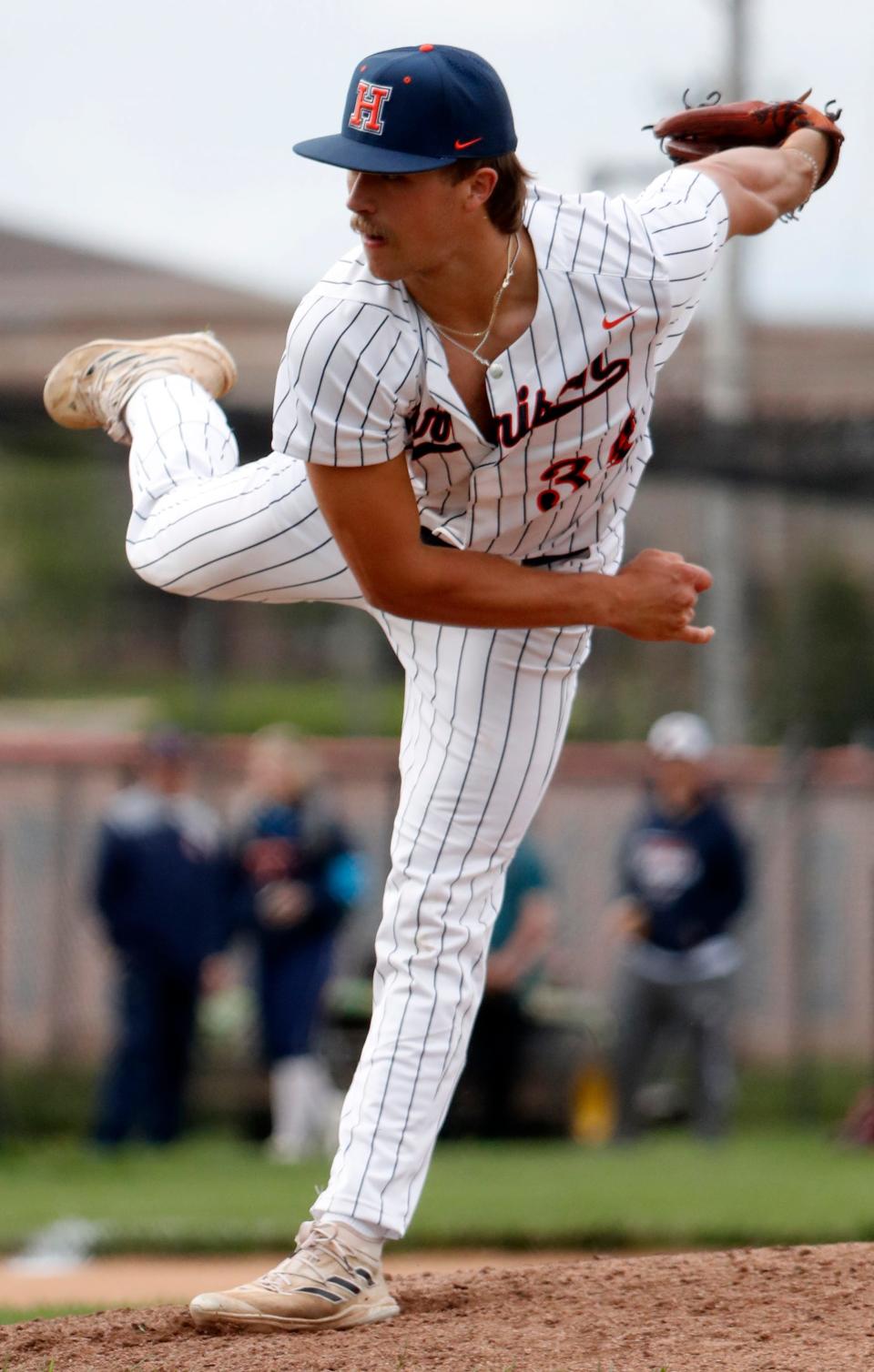 Harrison Raiders Aiden Schwartz (34) pitches during the IHSAA baseball game against the McCutcheon Mavericks, Wednesday, April 17, 2024, at Harrison High School in West Lafayette, Ind.