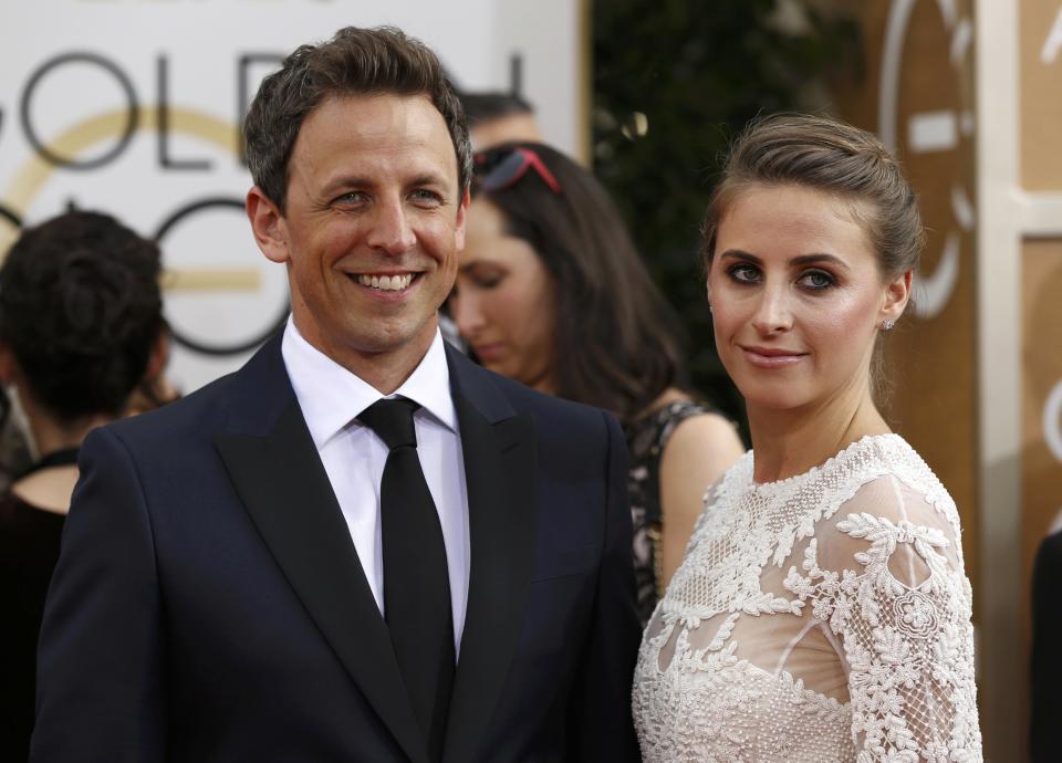 Actor Meyers and wife Alexi arrive at the 71st annual Golden Globe Awards in Beverly Hills