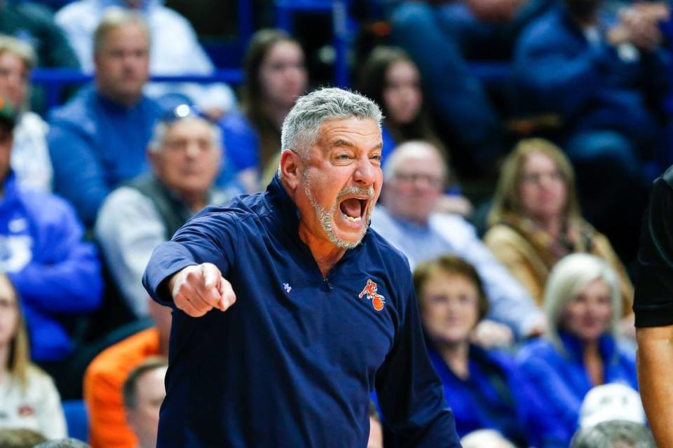 Auburn head coach Bruce Pearl yells to his players during Saturday’s game against Kentucky at Rupp Arena.