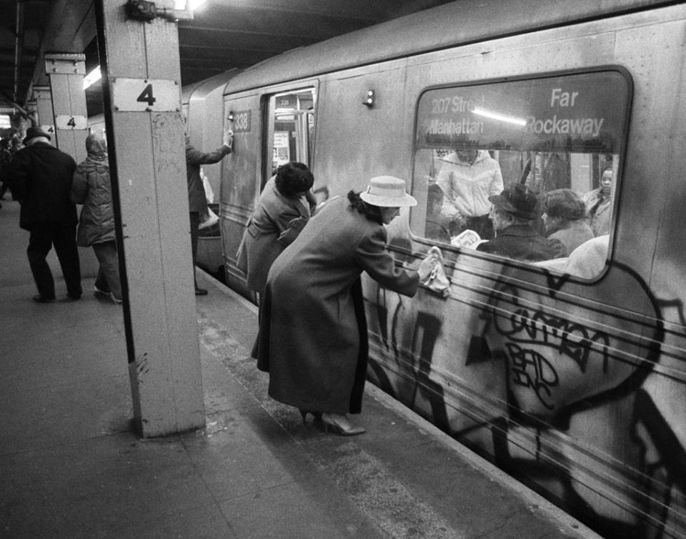 Volunteers clean subway train graffiti, 1983, (Credit: Robert Rosamilio/NY Daily News Archive via Getty Images)