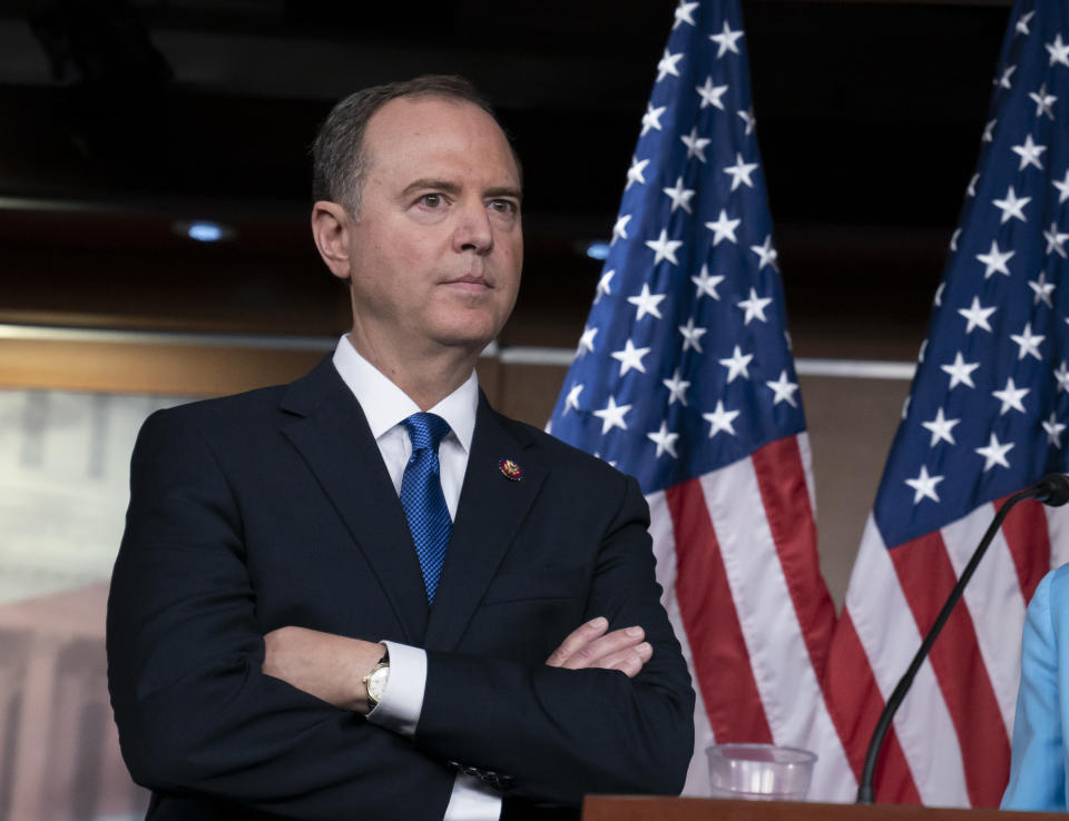 House Intelligence Committee Chairman Adam Schiff, D-Calif., listens at a news conference as House Democrats move ahead in the impeachment inquiry of President Donald Trump, at the Capitol in Washington, Wednesday, Oct. 2, 2019. In an unusual show of anger today, President Donald Trump defended his phone call with the president of Ukraine and said Adam Schiff may have committed treason by investigating the matter. (AP Photo/J. Scott Applewhite)