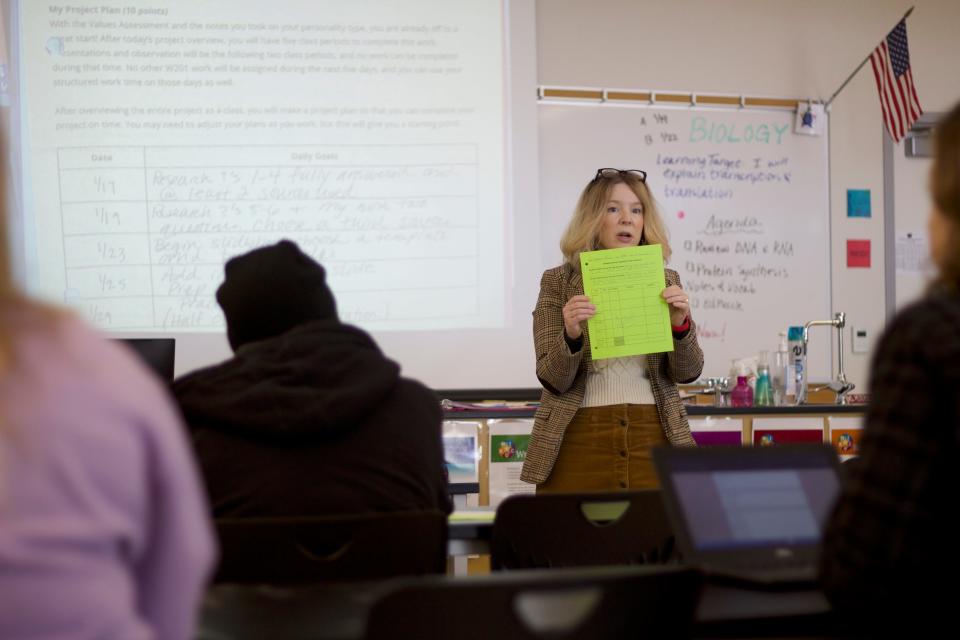 Teacher Nan Peterson explains an assignment during her Wolverine 201 class at Willamette High School on Tuesday, Jan. 23, 2024.