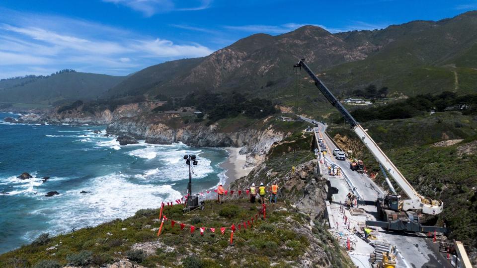 big sur, california caltrans employees and contractors work to