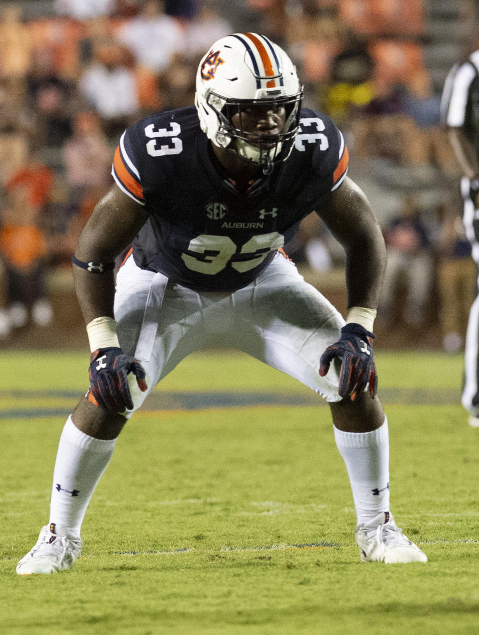 FILE - In this Sept. 8, 2018, file photo, Auburn linebacker K.J. Britt (33) lines up against Alabama State during the second half of an NCAA college football game in Auburn, Ala. The scouts were there in big numbers. But NFL prospects who were timed and tested, poked and prodded at the pro days didn’t have the usual contingent of underclassmen looking on and offering their support. (AP Photo/Vasha Hunt, File)