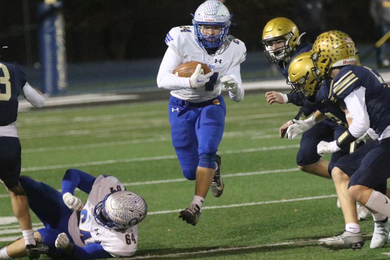 Ontario senior Chase Studer ran for 133 yards and four touchdowns during the Warriors' loss to Tiffin Columbian on Friday night.