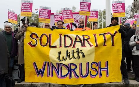 Activists, campaigners and trade unionists gathered outside Parliament in 2018 to call for restoring legal protections of the Windrush generation removed in the 2014 Immigration Act, an end to deportations and amnesty for those who came to the UK as minors - Credit: Wiktor Szymanowicz / Barcroft Images