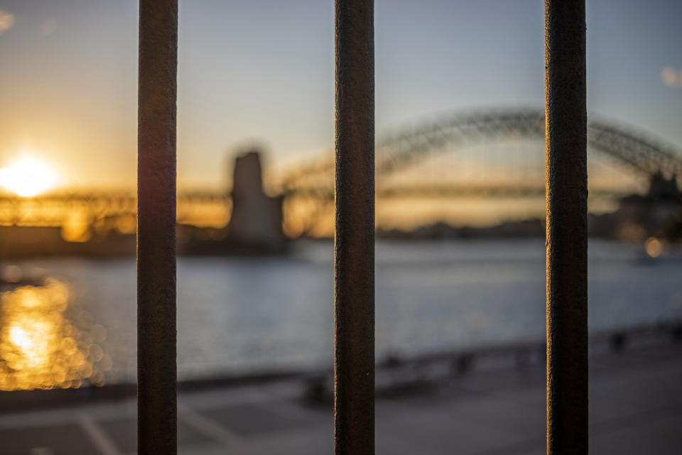 View through a metal bar fence