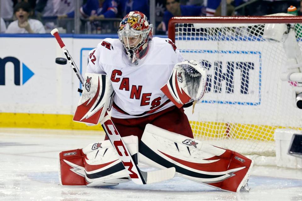 Carolina Hurricanes goaltender Antti Raanta makes a save against the New York Rangers during the first period of Game 3 of an NHL hockey Stanley Cup second-round playoff series, Sunday, May 22, 2022, in New York. (AP Photo/Adam Hunger)