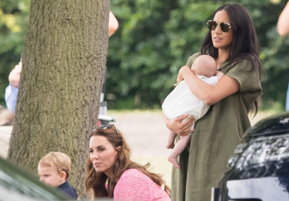 Meghan, Duchess of Sussex and Archie Harrison Mountbatten-Windsor, pictured with Catherine, Duchess of Cambridge and Prince Louis at the polo