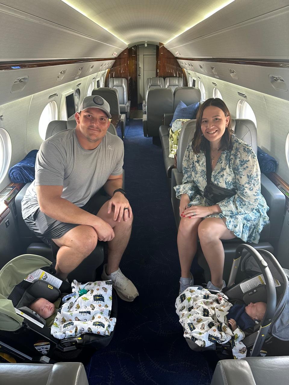Indianapolis Colts center Ryan Kelly and his wife, Emma, on Jim Irsay's plane bringing their twin baby boys, Ford and Duke, home.
