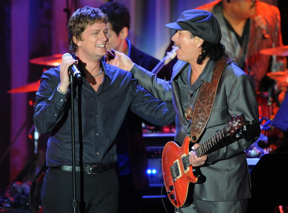 Rob Thomas and Carlos Santana still talk regularly. "I think the best thing that&rsquo;s ever come out of &lsquo;Smooth&rsquo; from any of the accolades, from any of the success is just that I got a really good friend and mentor out of that whole thing," Thomas said. (Photo: MARK RALSTON via Getty Images)