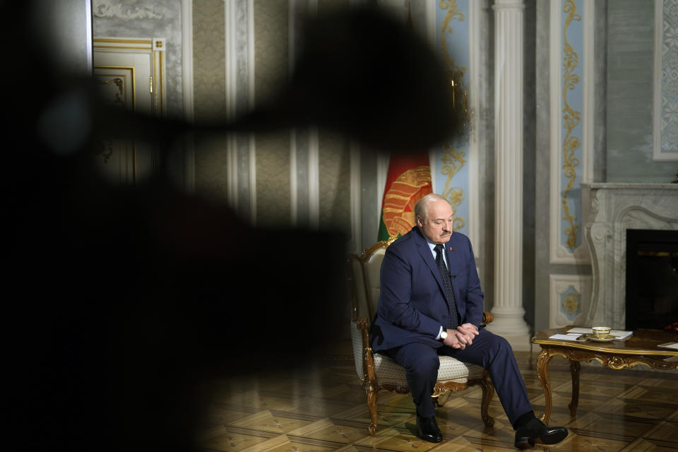 Belarus President Alexander Lukashenko listens to questions during an interview with The Associated Press at the Independence Palace in Minsk, Belarus, Thursday, May 5, 2022. (AP Photo/Markus Schreiber)