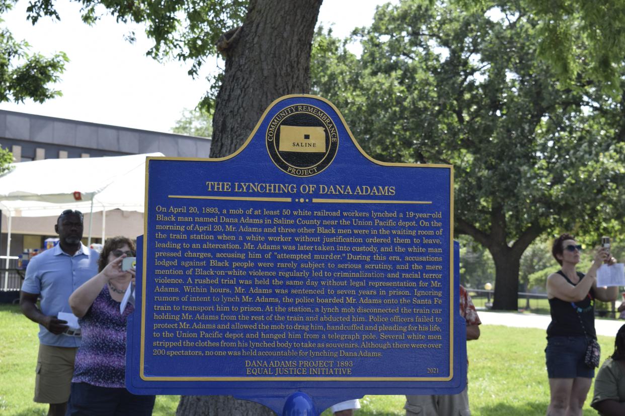 A community remembrance historical marker tells the story of the lynching of Dana Adams in 1893 in Salina. The marker was dedicated on Saturday, June 18, in Robert Caldwell Plaza.