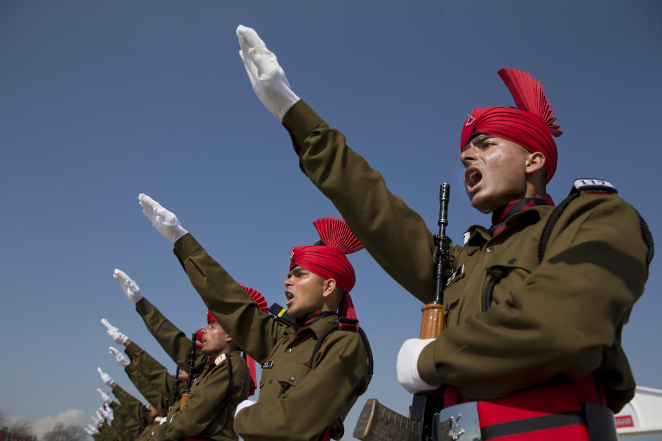 FILE- Newly graduated soldiers of the Jammu and Kashmir Light Infantry take oath during their commencement parade at a military base on the outskirts of Srinagar, Indian controlled Kashmir, March 9, 2019. For decades, India has tried to thwart Pakistan in a protracted dispute over Kashmir. But in the last two years, policy makers in New Delhi have been increasingly turning their focus to Beijing, in a significant shift in India's foreign policy as the nation celebrates 75 years of independence. (AP Photo/Dar Yasin, File)