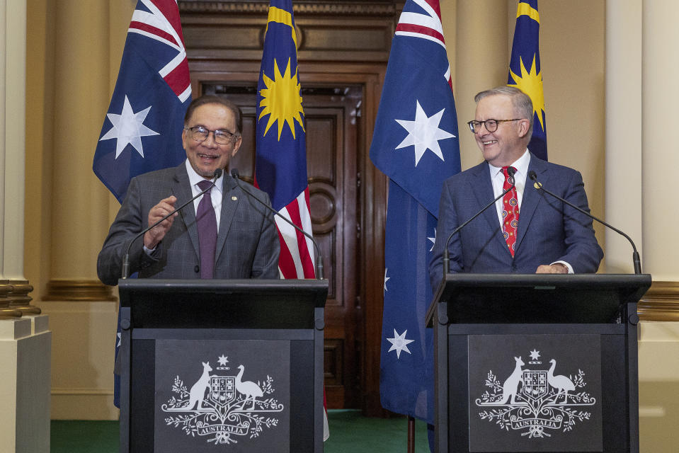 In this photo released by ASEAN via the Australian Government, the Prime Minister of Malaysia Anwar Ibrahim, left, and Australian Prime Minister Anthony Albanese hold a joint press conference ahead of the ASEAN Special Summit, in Melbourne, Monday, March 04, 2024. (Steve Christo, ASEAN/Australian Government via AP)