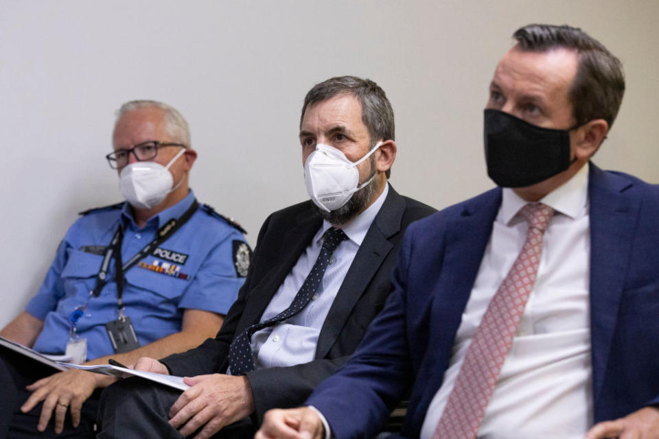 Chief Health Officer Dr Andrew Robertson (centre) seen with Premier Mark McGowan Sunday. Source: AAP