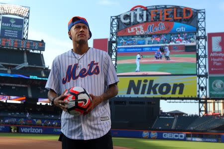 May 31, 2016; New York City, NY, USA; Brazilian soccer player Neymar poses for photos on the field before a game between the New York Mets and the Chicago White Sox at Citi Field. Brad Penner - USA TODAY Sports