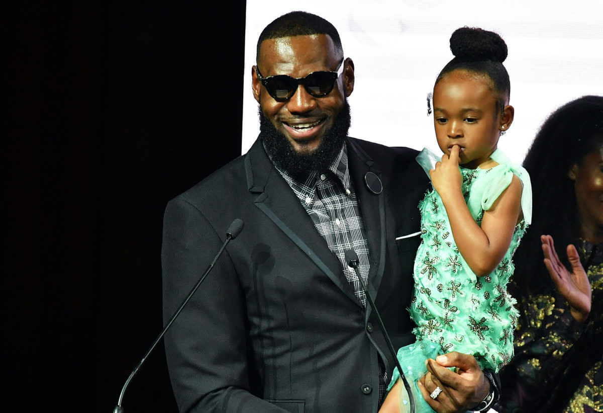 LeBron James with his daughter Zhuri at New York Fashion Week.