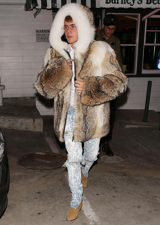 Kanye West ruffles feathers again as he steps out in flamboyant fur coat
