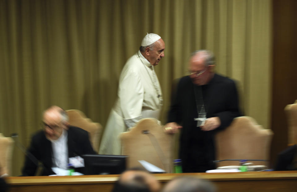 FILE - Pope Francis arrives for an afternoon session of the Amazon synod, at the Vatican, Tuesday, Oct. 8, 2019, during a three-week meeting on preserving the rainforest and ministering to its native people as he fended off attacks from conservatives who are opposed to his ecological agenda. In October 2023, the Vatican will open an unprecedented gathering of Catholic clergy and laypeople from around the world. The synod is intended to be a collegial, collaborative event. But the agenda includes divisive issues such as the role of women in the church and the inclusion of LGBTQ Catholics. (AP Photo/Alessandra Tarantino, File)