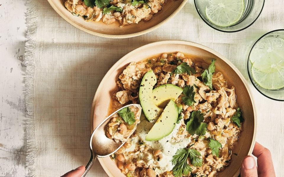 <p>This Southwestern-style white bean and chicken chili, from <em>Skinnytaste Meal Prep</em> by Gina Homolka, couldn’t be easier. It’s perfect for game day, holiday movie night or any time you need a comforting bowl of goodness. Get the recipe <a href="/1132939/parade/slow-cooker-white-bean-and-chicken-chili-recipe/" data-ylk="slk:HERE;elm:context_link;itc:0;sec:content-canvas" class="link "><strong>HERE</strong></a>.</p>