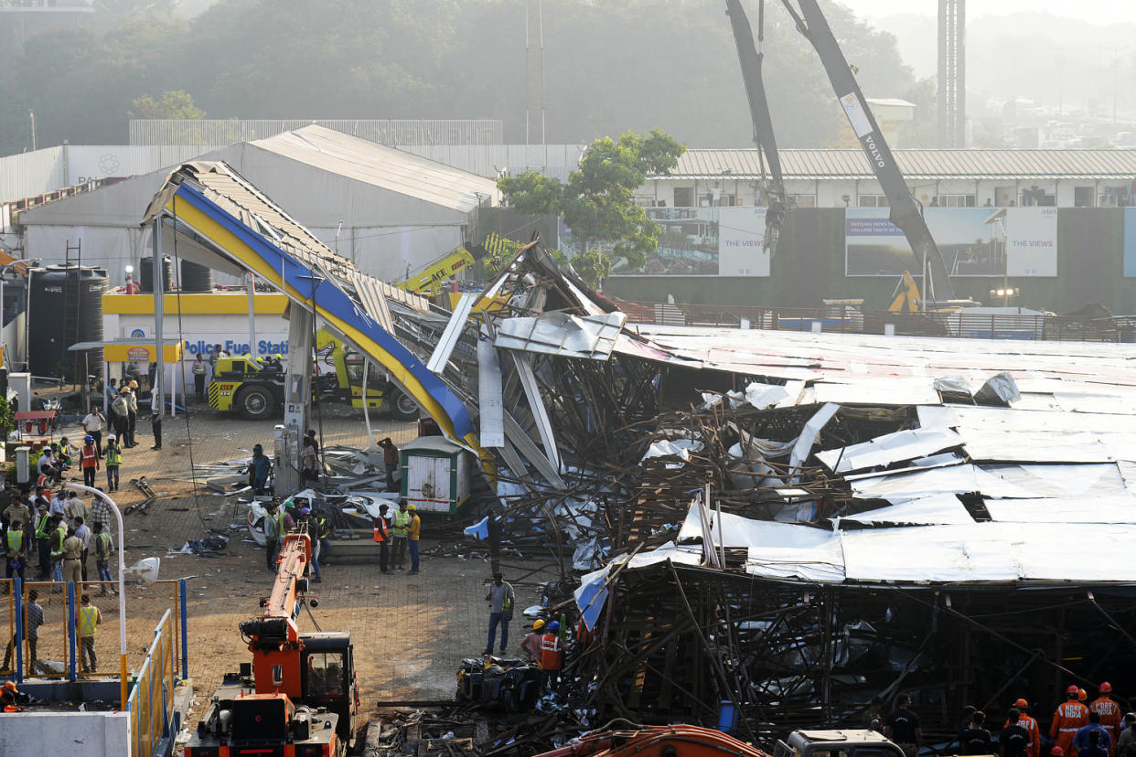More than a dozen people were killed and dozens were injured in the accident.  (Rajanish Kakade / AP)