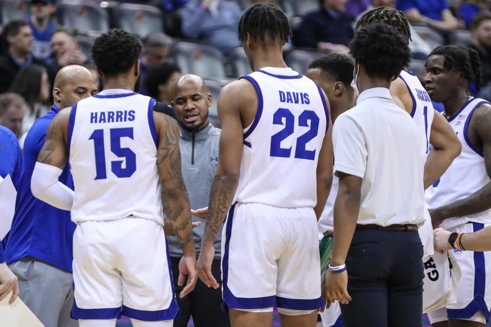 Seton Hall Pirates head coach Shaheen Holloway talks with his players during a timeout in the first half against the Creighton Bluejays at Prudential Center.
